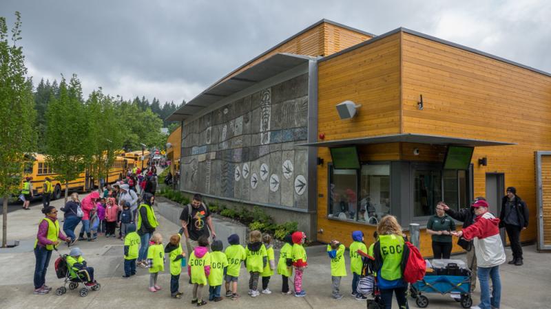 School kids line up outside the zoo